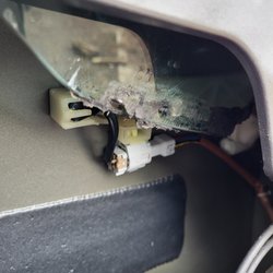 Jones Custom & Collision Center - "Free-floating" window showing where motor attachment was previously