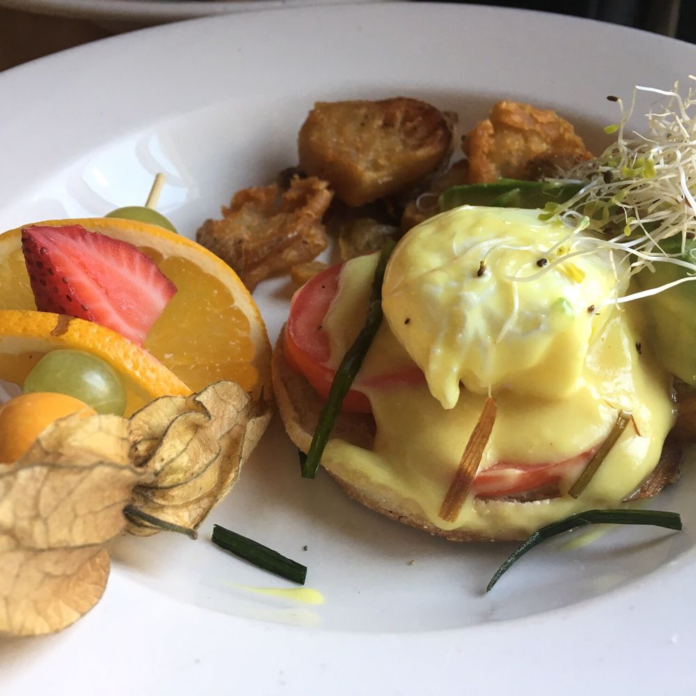 The Holy Grill - Half of the eggs Benedict - Burgers Near Me - Calgary, Alberta The Holy Grill - Half of the eggs Benedict - Burgers Near Me - Calgary, Alberta