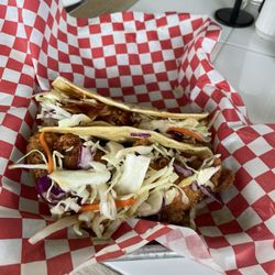 Hope Cafe & BBQ - Pork taco and a hot fried chicken honey and slaw taco.