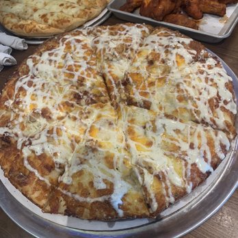 Sabinos Pizza Pub - Chicken Bacon Ranch pizza, Franks red hot wings, cheese bread, - Sports Bars Near Me - Leander, Texas
