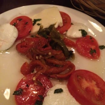 Amici Signature Italian - Half eaten cheese and tomato plate, mozzarella and goat cheese was amazing! - Caterers Near Me Amici Signature Italian - Half eaten cheese and tomato plate, mozzarella and goat cheese was amazing! - Caterers Near Me