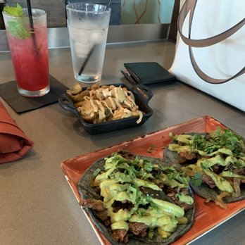 Descanso - The potato's and fried rice come with a delicious Padilla pepper sauce on top ! - Mexican Near Me - Costa Mesa, California