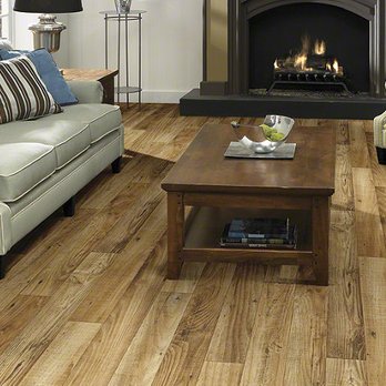Foglio's Flooring Center - a living room with a fireplace - Carpeting Near Me - Marmora, New Jersey