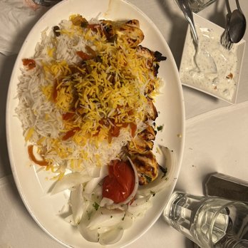 Shamshiry - a plate of food on a table - Middle Eastern Near Me - Vienna, Virginia