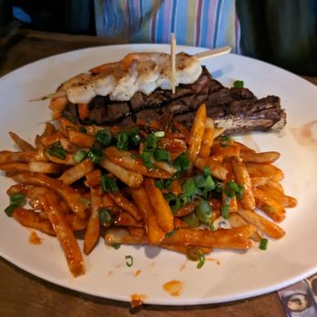 Yard House - 20oz Bone-in Ribeye with grilled shrimp skewer - New American Near Me - Concord, California