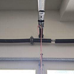 Amigo Garage Doors - Broken spring.