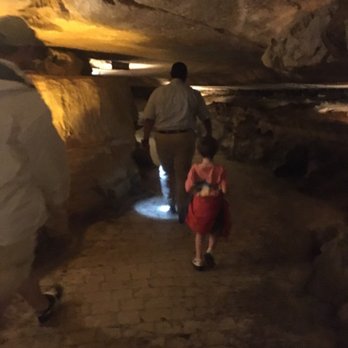 Ruby Falls - My son walking behind our guide Dennis. I don't see how any guide could be better. - Landmarks & Historical Buildings Near Me - Chattanooga, Tennessee