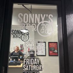 Sonny's BBQ - Door of business.