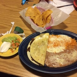 El Camino Real Mexican Restaurant - Quesadilla with rice and beans covered in cheese sauce
