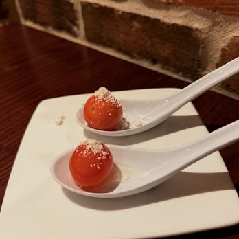 Juniper - Cherry tomato with bacon dust amuse-bouche - New American Near Me - Tulsa, Oklahoma