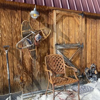 Cedar Ridge Ranch - Front of cabin, complimentary snow shoes - Horse Boarding Near Me - Carbondale, Colorado