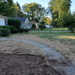 Notice the neighbors lawn in background. Notice the neighbors lawn in background.
