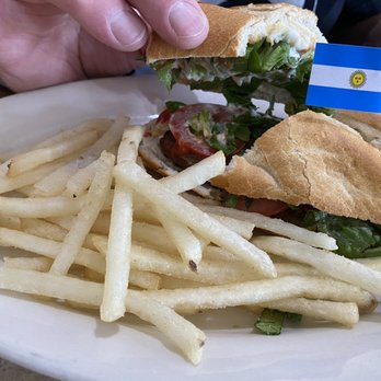 Los Hornos - Choripan, chorizo sammie with chimichurri - Empanadas Near Me - Kansas City, Missouri