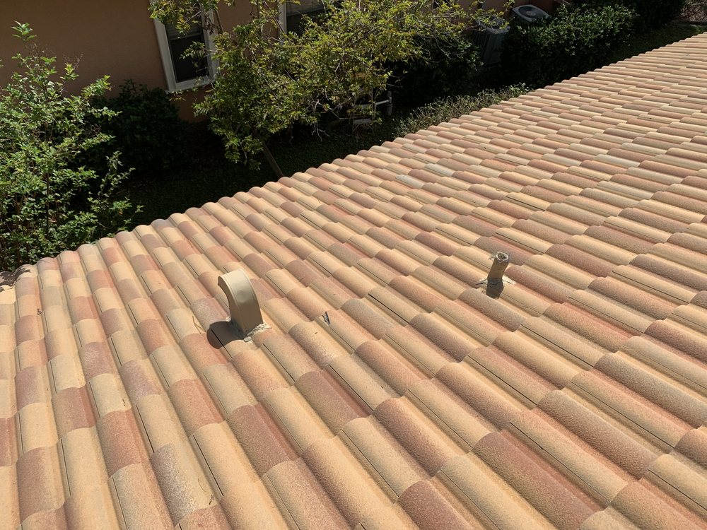 Slide of E&C Roofing and More