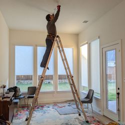 Rockwall Handyman Services - Before chandelier install: Arthur with his lasers!