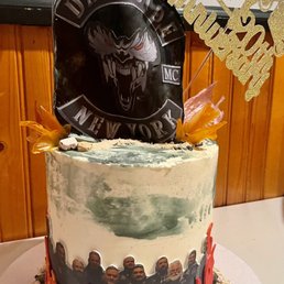 a cake decorated with a picture of the band a cake decorated with a picture of the band