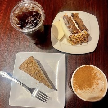 The Library - Flavored iced tea, slice of carrot cake, hot chai & slice of New York cheesecake.   @ojbaylen - Coffee & Tea Near Me - Long Beach, California