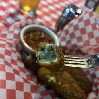 Gino's East - Magnificent Mile - Spinach mozzarella sticks - Pizza Near Me - Chicago, Illinois Gino's East - Magnificent Mile - Spinach mozzarella sticks - Pizza Near Me - Chicago, Illinois