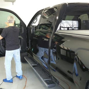 Tints Unlimited - Tony working his magic on the truck! - Home Window Tinting Near Me - Elmhurst, Illinois Tints Unlimited - Tony working his magic on the truck! - Home Window Tinting Near Me - Elmhurst, Illinois
