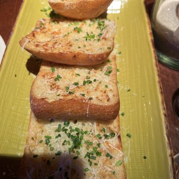 Tavern House Kitchen + Bar - Garlic bread. Looks boring but it's really good. - New American Near Me - Newport Beach, California Tavern House Kitchen + Bar - Garlic bread. Looks boring but it's really good. - New American Near Me - Newport Beach, California