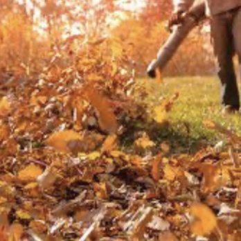 Goldsmith Landscaping - a man using a leaf blower - Landscaping Near Me