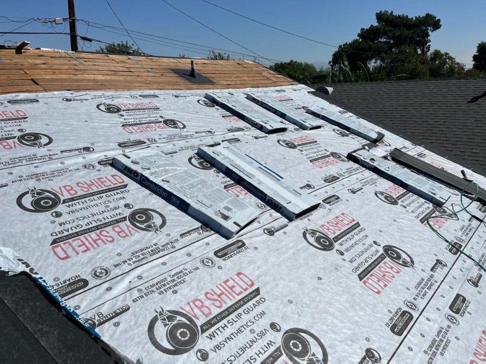 Slide of United Master Roofing
