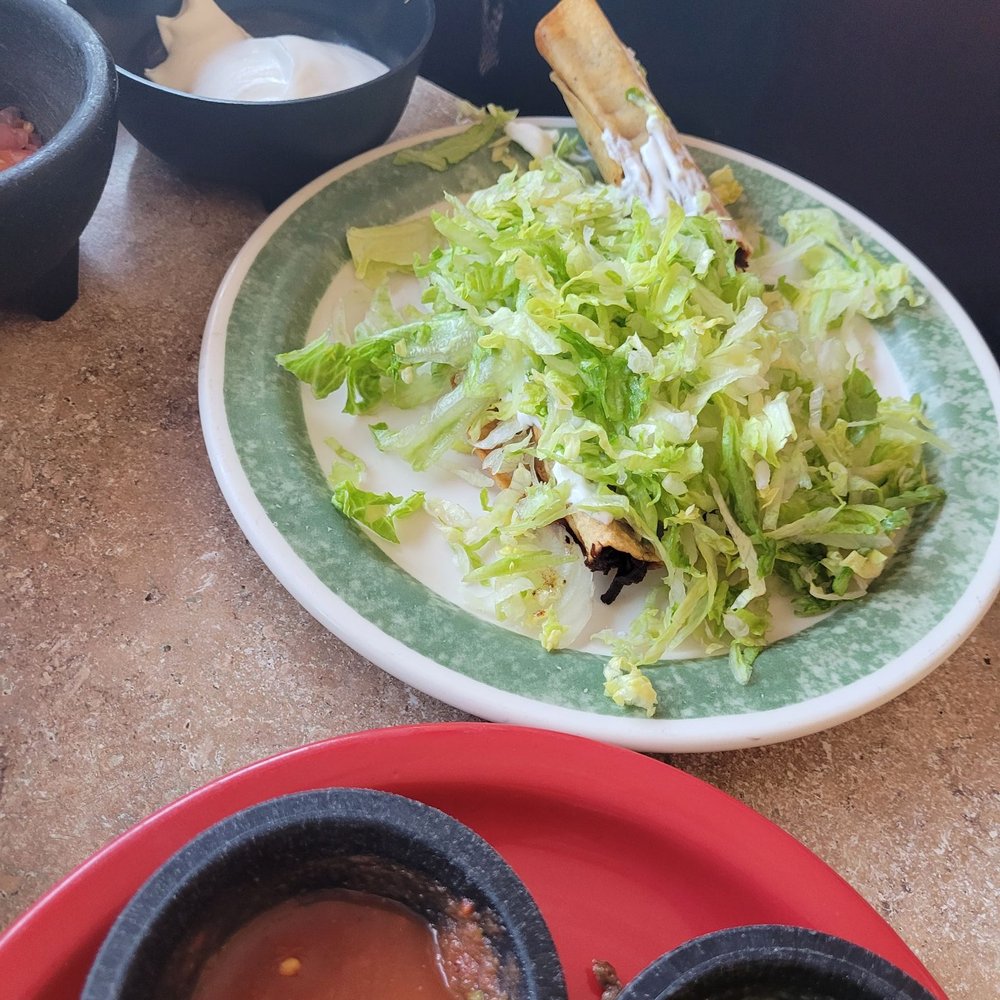 El Molcajete - Flautas on top of sour cream under a bed of lettuce? - Mexican Near Me - Ukiah, California El Molcajete - Flautas on top of sour cream under a bed of lettuce? - Mexican Near Me - Ukiah, California