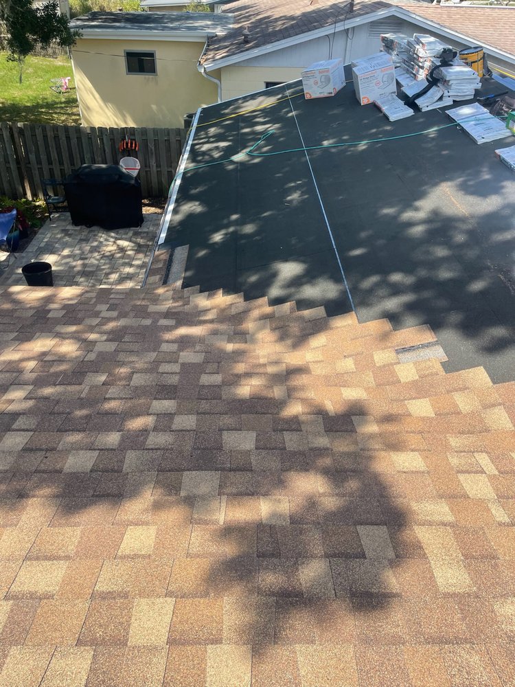 Slide of Arch Roofing & Repair