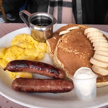 Katy's Place - Kauai Combo - Banana pancakes, Hawaiian coconut syrup, mango sausage, scrambled eggs with fresh pineapple - Breakfast & Brunch Near Me - Carmel, California Katy's Place - Kauai Combo - Banana pancakes, Hawaiian coconut syrup, mango sausage, scrambled eggs with fresh pineapple - Breakfast & Brunch Near Me - Carmel, California