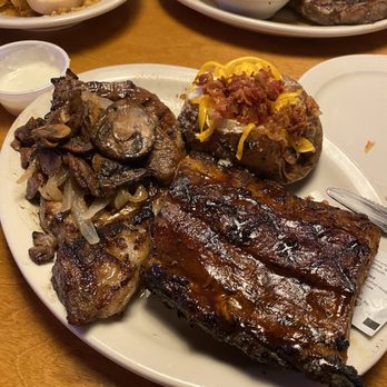 Texas Roadhouse - Ribeye* 12oz & Ribs with baked potato - American Near Me - Mansfield, Texas Texas Roadhouse - Ribeye* 12oz & Ribs with baked potato - American Near Me - Mansfield, Texas
