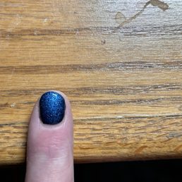Only filed one side of my nail, not the whole thing to make it evenly round. Only filed one side of my nail, not the whole thing to make it evenly round.