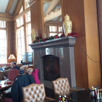 Cinnabar Lounge - Enormous Windows with a roaring fireplace are great on a cold winter day. - Lounges Near Me - Ogden, Utah