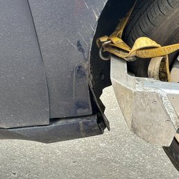 Damage to my car done by an employee of Matthews Towing. Damage to my car done by an employee of Matthews Towing.