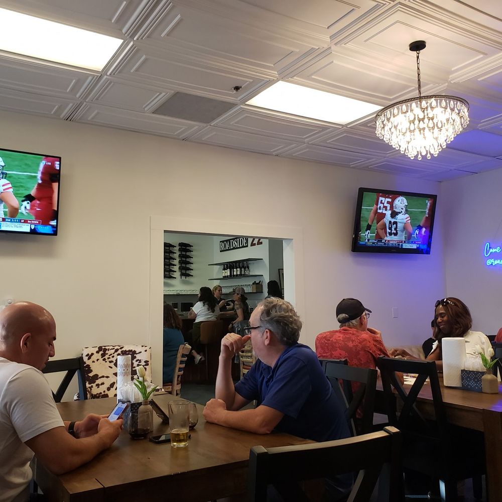 Different angle of the side room. 4 or 5 large tables, 3 TVs. Different angle of the side room. 4 or 5 large tables, 3 TVs.
