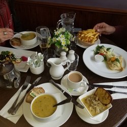 Riverside Restaurant - Grilled cod w/chips & salad, black sausage & veg soup, & veg soup w/garlic mushrm cream sauce w/garlic toast. Amazingly good!