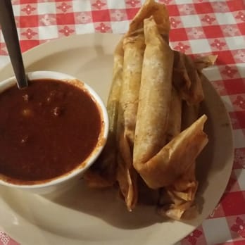 Doe's Eat Place - Tamales with a chili sauce - Steakhouses Near Me - Bentonville, Arkansas Doe's Eat Place - Tamales with a chili sauce - Steakhouses Near Me - Bentonville, Arkansas