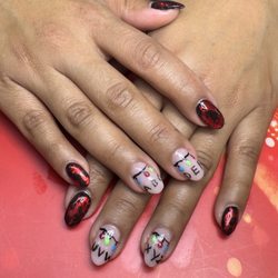 Nail Fever & Spa - Ask for Lynn. She did an amazing job. Can you guess what theme? Stranger Things Theme. I love it so much!