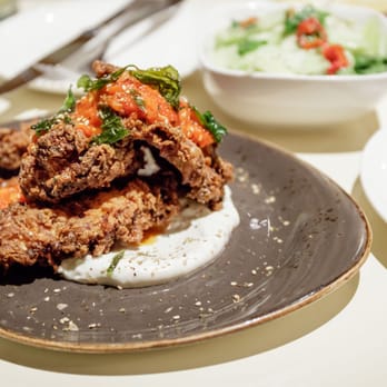 The Well - Fried Chicken $16.00 (with fenugreek yogurt, chili sauce, za'atar, fried basil) - Bars Near Me - Oakland, California The Well - Fried Chicken $16.00 (with fenugreek yogurt, chili sauce, za'atar, fried basil) - Bars Near Me - Oakland, California