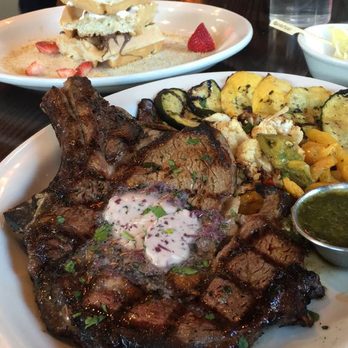 Dinerbar - Bone-in ribeye (garlic herb butter, grilled veggies).... (meat tastes amazing, which is hard to find). - Diners Near Me - Rego Park, New York Dinerbar - Bone-in ribeye (garlic herb butter, grilled veggies).... (meat tastes amazing, which is hard to find). - Diners Near Me - Rego Park, New York