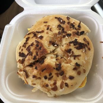 Bakery Plus - Onion, sausage egg and cheese bagel - Donuts Near Me - Orlando, Florida
