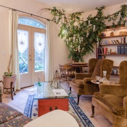 Auberge de Seattle French Country Inn - Chef Quarters Cottage Living Room and French doors to outside private pateo