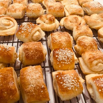 Ellie love cake - a variety of pastries on a cooling rack - Bakeries Near Me