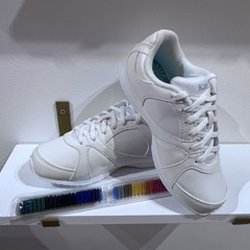 At The Barre - We offer selection of cheer shoes.