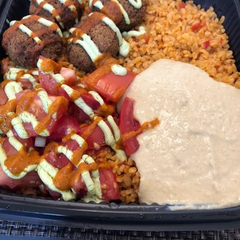 Simit Fresh Mediterranean Restaurant - Create your own bowl with falafel, rice, hummus, and tomatoes - Middle Eastern Near Me - Naples, Florida Simit Fresh Mediterranean Restaurant - Create your own bowl with falafel, rice, hummus, and tomatoes - Middle Eastern Near Me - Naples, Florida