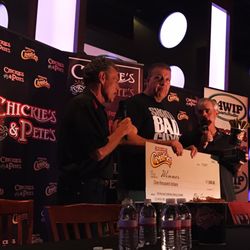 Play2 - "El Wingador" presented with $1,000 and crab fries for life from owner Pete.