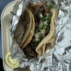De La O Kitchen - Carne Asada taco and green salsa.