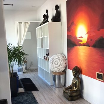 Solntse Hot Yoga - The lobby features a mural of a sunset, painted by a 16-year-old Eva Reese. It is symbolic to the name of the studio, SOLNTSE means "sun". - Yoga Near Me - Wading River, New York Solntse Hot Yoga - The lobby features a mural of a sunset, painted by a 16-year-old Eva Reese. It is symbolic to the name of the studio, SOLNTSE means "sun". - Yoga Near Me - Wading River, New York