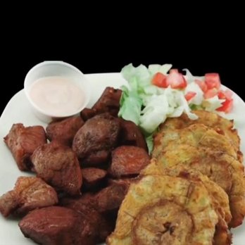 The Latin Corner - Carne de Cerdo Frita con Tostones / Fried Pork with Tostones - Puerto Rican Near Me - Deltona, Florida The Latin Corner - Carne de Cerdo Frita con Tostones / Fried Pork with Tostones - Puerto Rican Near Me - Deltona, Florida