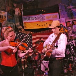 Howling Dog Saloon - Google Caitlin Warbelow to see her playing "Orange Blossom Special" and "Draggin' the Bow" at the Howling Dog Saloon.