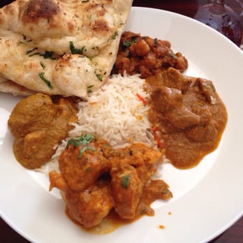 Tandoori Masala - A delicious assortment of tandoori masala, lamb dahi gosh, Chana masala, aloo gobi, and garlic naan. - Indian Near Me - Brooklyn, New York Tandoori Masala - A delicious assortment of tandoori masala, lamb dahi gosh, Chana masala, aloo gobi, and garlic naan. - Indian Near Me - Brooklyn, New York